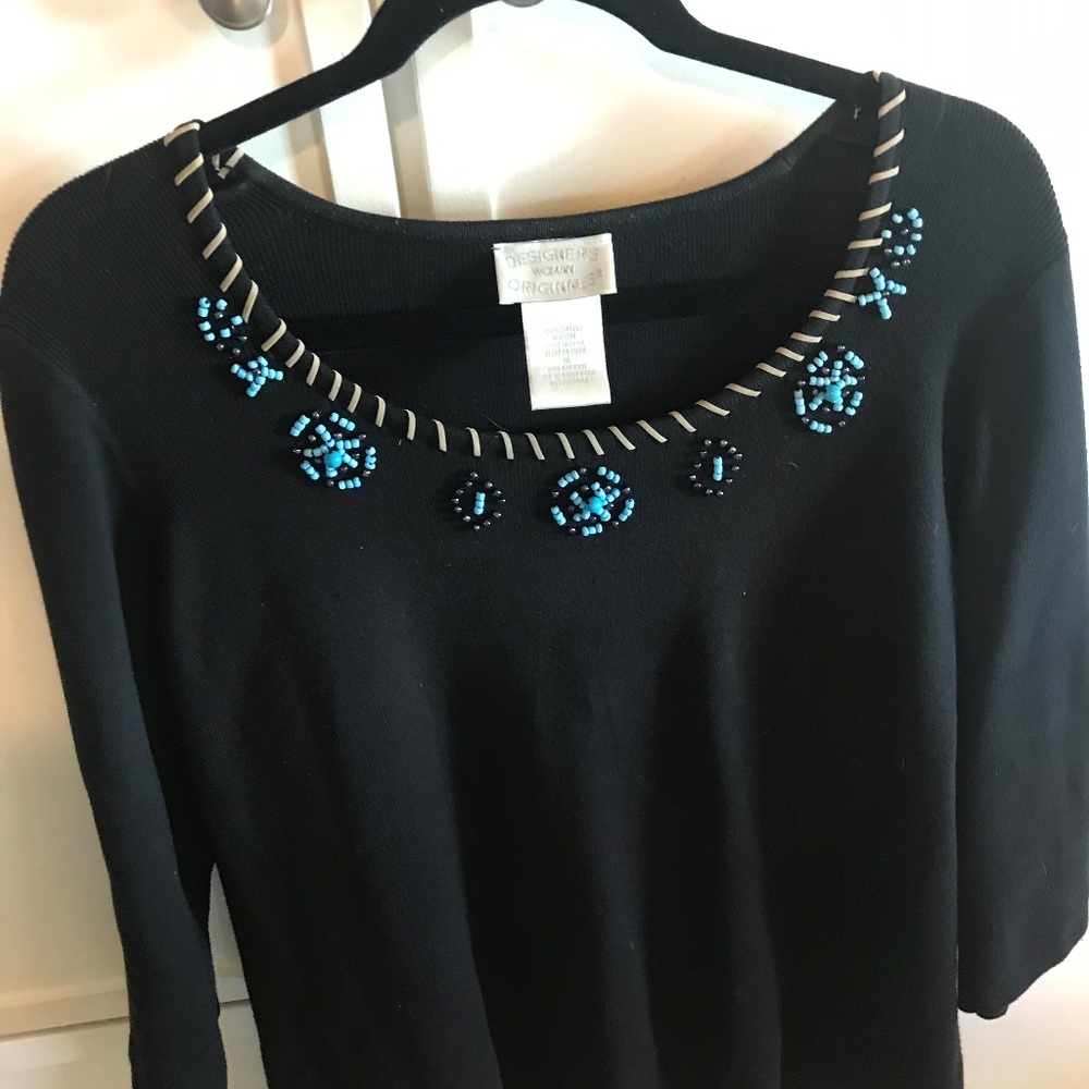 Designer Woman black knit sweater with beaded trim
